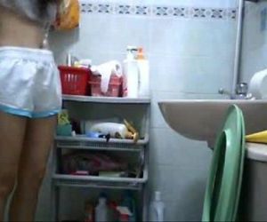 Hiddencam young girl in toilet - 55 sec