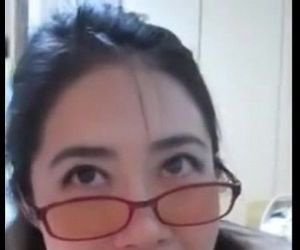 Geeky Asian girlfriend sucks a big dick and gets a facial..